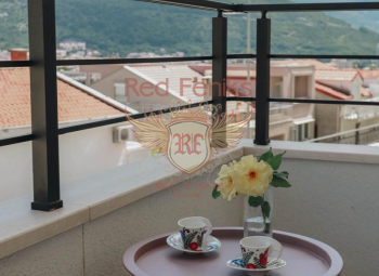 For sale one bedroom apartment in Budva with a mountain view.