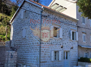 For sale In the coastal pearl of Montenegro, the village of Prcanj, a 130m2 house on the beachfront is for sale.