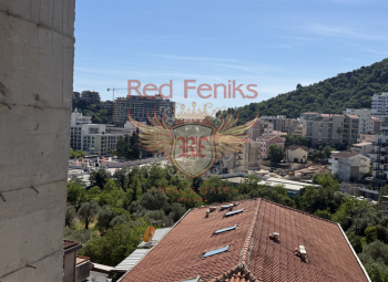 For sale two bedrooms apartment under construction in a new building in Becici .