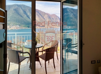 In a new modern complex on the shore of the Boka Kotor Bay, a two-bedroom apartment is for sale.