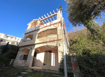 For sale three-storey house in Budva with mountain views.