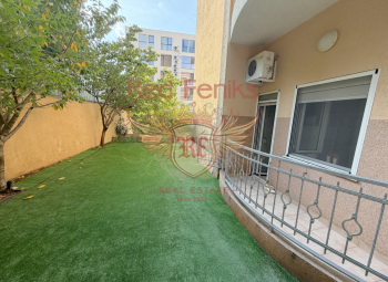 For sale two bedrooms apartment in Becici with a small plot .