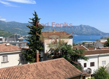 For sale One bedroom apartment with mountain, sea and coastal views.