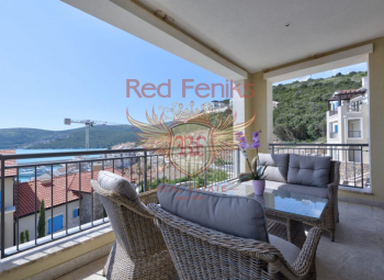 Property Details:


	Location: Luštica Bay
	Apartment Area: 117 m² + 26 m² garden
	Number of Bedrooms: 2
	Number of Bathrooms: 2


Description:

Nestled in the picturesque Luštica Bay, this exquisite apartment embodies the maritime charm of Montenegrin fishing villages.