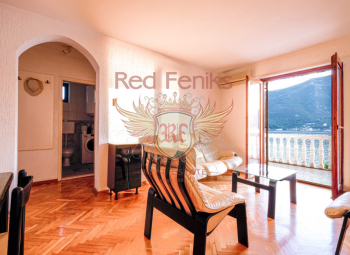 Pay special attention to this comfortable 4-room duplex apartment with an incredible view of the Bay of Kotor in the beautiful village of Dobrota.