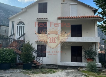 For sale hose in Kotor Skaljari located on a plot of 1139m2 with total area of 337 m2

The house consists of four apartments and two parts

First floor- separate entrance apartment with two bedrooms,

living room, spacious kitchen - fully furnished and ready for occupancy, 71m2

Second floor: independent apartment with two bedrooms,

living room, kitchen and terrace with sea view, 76m2

The second part of the building consists of one and three apartments- 71,74,42 m2.