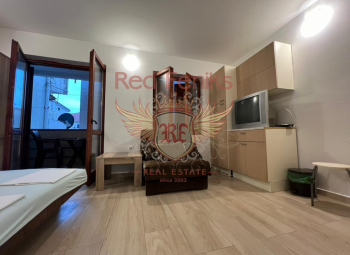 For sale small one bedroom flat in an old house in Rafailovici on the first floor.