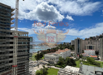 For sale large studio apartment in Hotel Wow with a sea view and the view to old town.