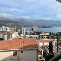 Apartments in a new modern house in the center of tourist life of Montenegro, the city of Budva.