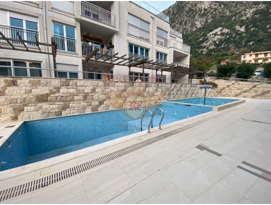 Two bedroom apartment with pool in Dobrota, apartments in Montenegro, apartments with high rental potential in Montenegro buy, apartments in Montenegro buy