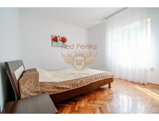 Situated in the peaceful coastal village of Krašići, just steps from the sea, this impressive property offers a rare combination of space, privacy, and investment potential.